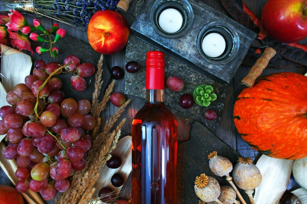 Food and wine bottle laid out on a surface